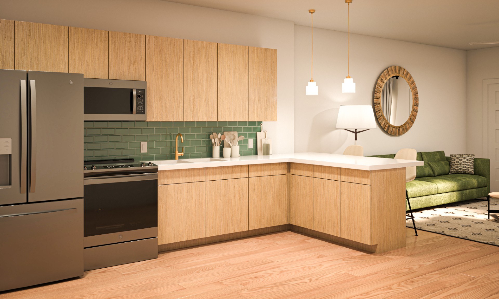 A modern kitchen with wooden cabinets and a green couch.